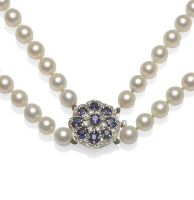 Lot 527 - A Cultured Pearl Necklace, the two rows of 58:61 uniform knotted cultured pearls to a 9 carat white