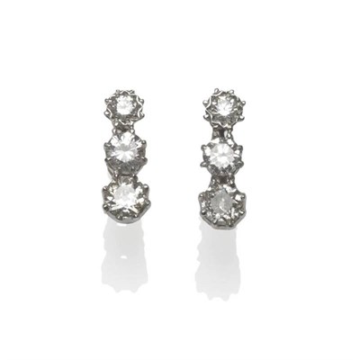 Lot 529 - A Pair of Diamond Three Stone Earrings, the graduated round brilliant and old cut diamonds in white