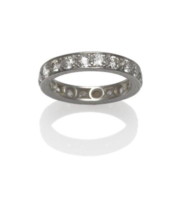 Lot 532 - A Diamond Eternity Ring, circa 1930, twenty old cut diamonds within white claw settings, to a...