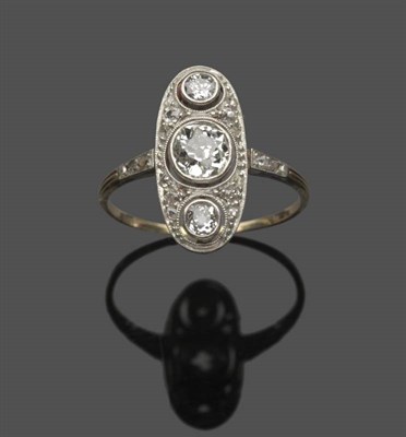 Lot 542 - An Art Deco Diamond Cluster Ring, of lozenge form, with three graduated old cut diamonds...