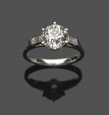 Lot 545 - An 18 Carat White Gold Diamond Solitaire Ring, the old cut diamond in a six claw setting, a...