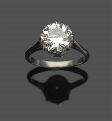 Lot 547 - An Early 20th Century Diamond Solitaire Ring, the old cut diamond in a white eight claw setting, to