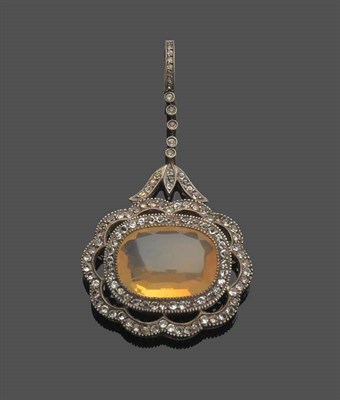 Lot 548 - A Late Victorian Pendant, the stylised floral frame set with paste stones throughout, and suspended