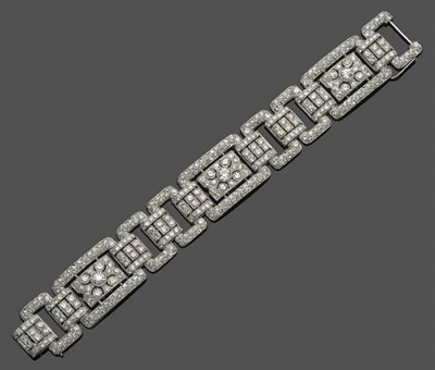 Lot 549 - An Art Deco Diamond Bracelet, of three panels each with an oblong pierced plaque, set with old...