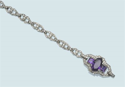 Lot 566 - An Art Deco Amethyst and Diamond Bracelet, a central geometric form set with a elongated...