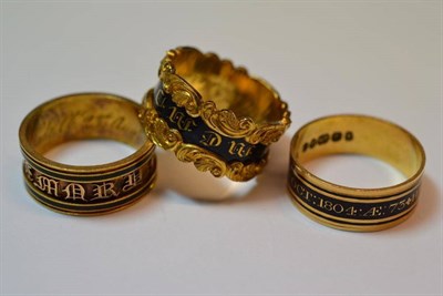 Lot 569 - Three 18 Carat Gold Mourning Rings, each enamelled with black enamel to the outer band, each...