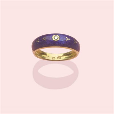 Lot 570 - An 18 Carat Gold Modern Ring, by Faberge, of domed band style, the head enamelled in blue, with...