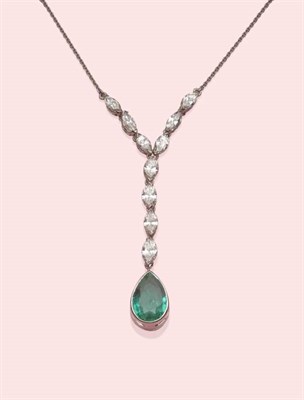 Lot 571 - An Emerald and Diamond Necklace, a pear cut emerald in a white rubbed over setting, suspended...