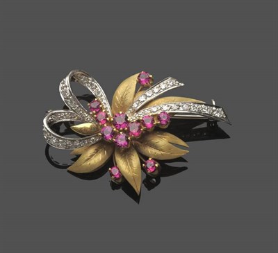 Lot 591 - An 18 Carat Gold Ruby and Diamond Spray Brooch, matt finished yellow gold stylised leaves with...