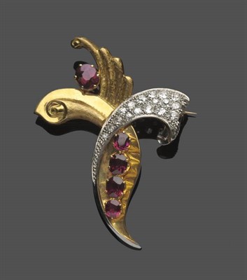 Lot 595 - An 18 Carat Gold Ruby and Diamond Brooch, of abstract form, set with oval cut rubies and old...