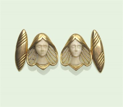 Lot 609 - A Pair of Art Nouveau Cufflinks, depicting a maiden in ivory within a plique-a-jour frame,...