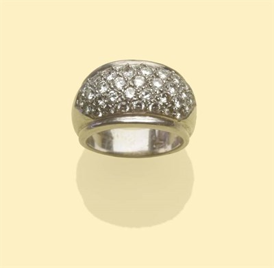 Lot 635 - An 18 Carat White Gold Diamond Bombé Style Ring, five rows of round brilliant cut diamonds...