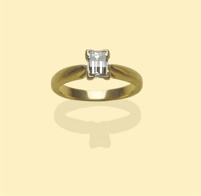 Lot 644 - An 18 Carat Gold Millennium Cut Diamond Solitaire Ring, the diamond in a white corner claw setting