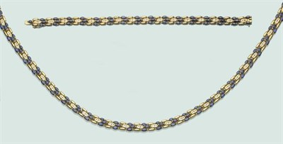 Lot 652 - A Sapphire and Diamond Necklace and Bracelet Set, series of marquise cut sapphires in yellow...