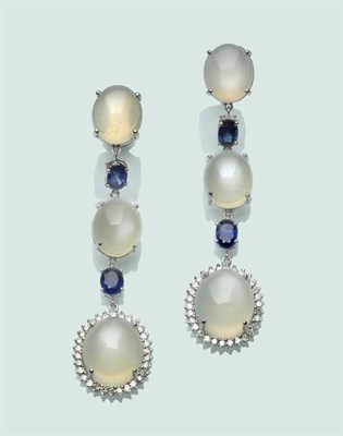 Lot 653 - A Pair of Moonstone, Sapphire and Diamond Drop Earrings, three cabochon moonstones alternate...