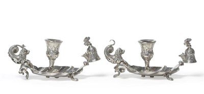 Lot 662 - A Pair of Continental White Metal Chambersticks, probably German, circa 1880, of shell form...