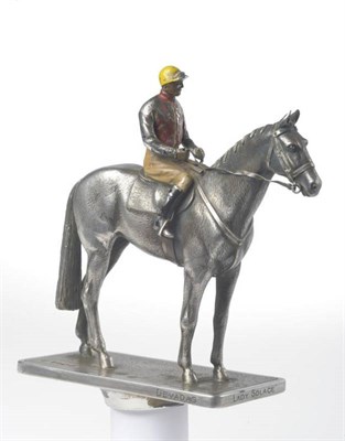 Lot 672 - A George VI Silver and Cold Enamelled Racehorse with Jockey Up Car Mascot, Goldsmiths &...