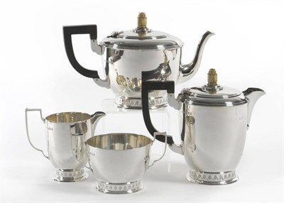 Lot 673 - An Art Deco Silver Four Piece Teaset, Ollivant & Botsford, London 1932, of flared circular form...