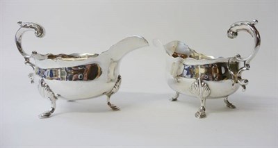 Lot 676 - A Pair of George V Silver Sauceboats, Sheffield 1922, of inverted helmet shape, acanthus sheathed C