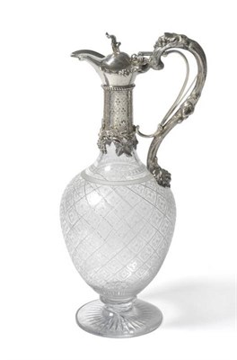 Lot 695 - A Victorian Silver Mounted Claret Jug, Richards & Brown, London 1865, the star cut spreading...