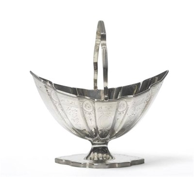 Lot 706 - A George III Silver Sugar Basket, Hester Bateman, London 1790, the shaped reeded navette...