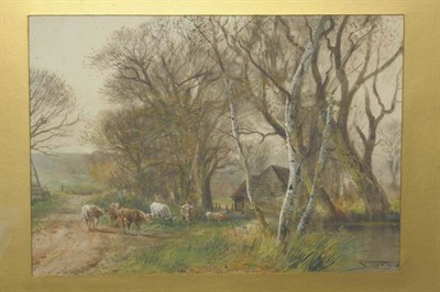 Lot 744 - Henry Charles Fox RBA (1860-1929) Country lane with cattle beside a pond Signed and dated 1918,...