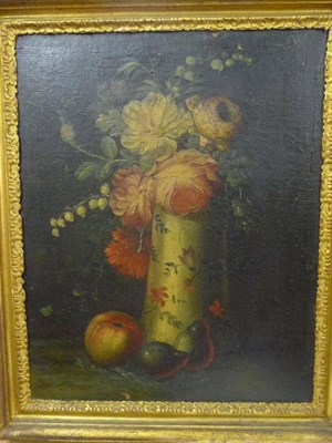 Lot 875 - Continental School (18th/19th century) Still life of flowers in a patterned vase, with fruit in the