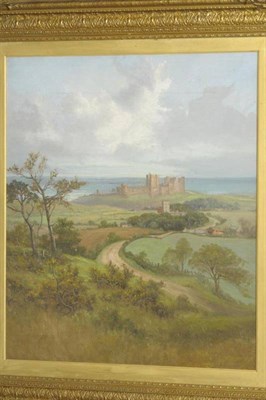 Lot 904 - Francis (Frank) Thomas Carter (1853-1934) Bamburgh Castle Signed, oil on canvas, 76.5cm by 63.5cm