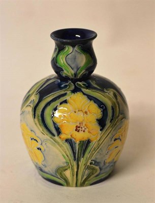 Lot 1124 - A William Moorcroft Macintyre Florian Ware Vase, circa 1902, tubelined with yellow flowers, on...