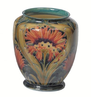 Lot 1130 - A William Moorcroft Macintyre Revived Cornflower Pattern Vase, circa 1910, against a mottled...