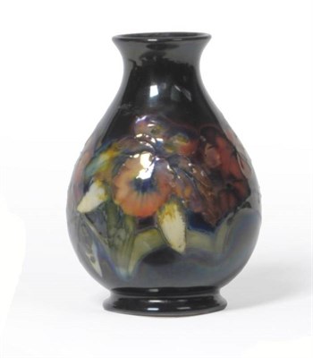 Lot 1132 - A William Moorcroft Flambé Orchid Pattern Vase, impressed factory marks, 11.5cm