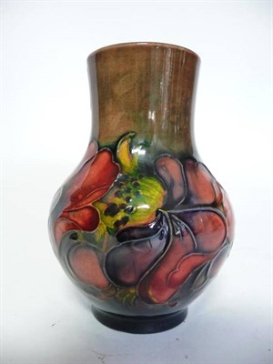 Lot 1133 - A Walter Moorcroft Flambé Anemone Pattern Vase, impressed factory marks, facsimile signature...