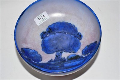 Lot 1134 - A William Moorcroft Dawn Landscape Footed Bowl, circa 1928, matt glaze, chevron border,...