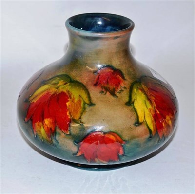 Lot 1136 - A William Moorcroft Flambé Leaf Pattern Squat Vase, impressed factory marks and POTTER TO H.M...