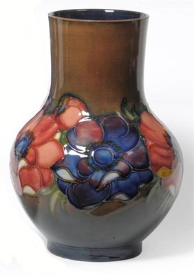 Lot 1138 - A Walter Moorcroft Flambé Anemone Pattern Vase, circa 1950, impressed factory marks and blue...