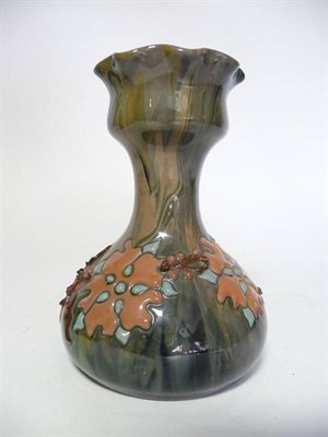 Lot 1144 - A Sunflower Pottery Vase, by Sir Edmund Elton, the long neck with flaring pinched rim, applied with