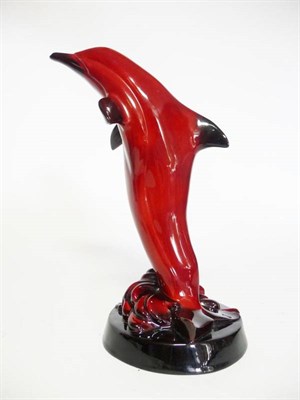 Lot 1152 - A Royal Doulton Flambé Dolphin  "The Leap ", designed by Adrian Hughes, issued 1983, printed...