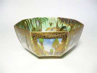 Lot 1161 - A Wedgwood Fairyland Lustre Fairy in a Cage and Castle on a Road Pattern Octagon Bowl, circa 1920s