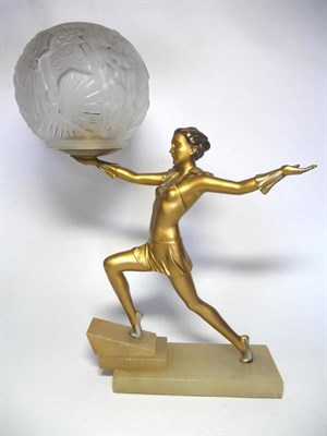 Lot 1191 - A French Art Deco Gilt and Silvered Spelter Figural Lamp, modelled as a young woman, with arms...