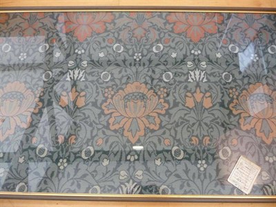 Lot 1203 - "Pomegranate ": A Framed Panel of Woven-Wool Fabric, by Morris & Co., woven in red and green,...