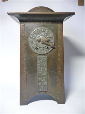 Lot 1214 - An Arts & Crafts Hammered Copper and Pewter Mantel Clock, with domed top above a 11cm pewter...