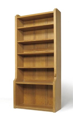 Lot 1224 - A Robert  "Mouseman " Thompson Oak 6' Open Bookcase, solid ends and panelled back, raised...