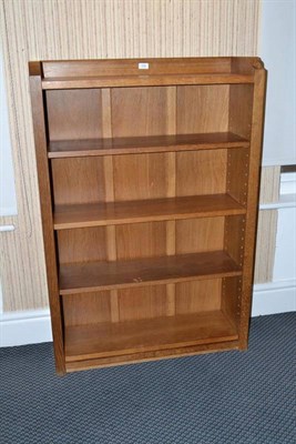 Lot 1226 - A Robert  "Mouseman " Thompson Oak 4' Open Bookcase, solid ends and panelled back, raised...