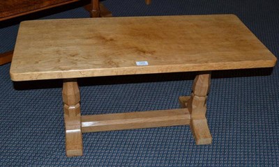 Lot 1245 - A Robert  "Mouseman " Thompson Oak 3' Rectangular Coffee Table, on two octagonal legs, joined...