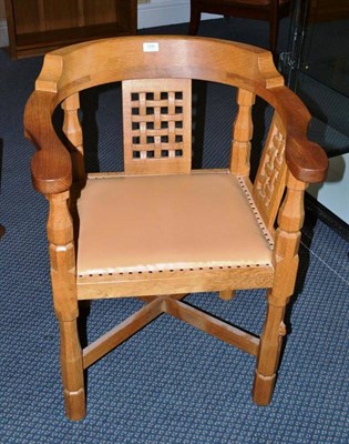 Lot 1246 - A Robert  "Mouseman " Thompson Oak Monk's Chair, with curved back and shaped arms, over three...