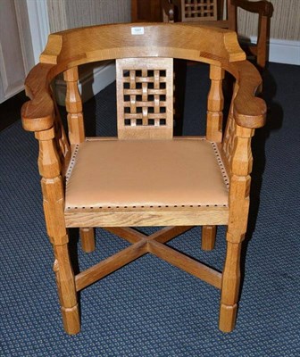 Lot 1247 - A Robert  "Mouseman " Thompson Oak Monk's Chair, with curved back and shaped arms, over three...