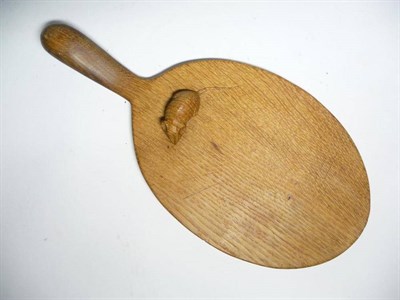 Lot 1251 - A Robert  "Mouseman " Thompson Oak Cheese Board, with carved mouse signature on the board, 38cm