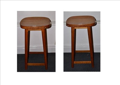 Lot 1253 - A Pair of Robert  "Mouseman " Thompson Oak High Bar Stools, on four octagonal legs joined by...