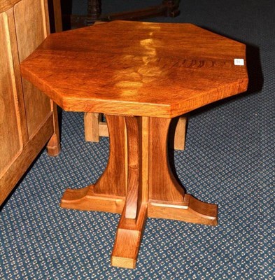 Lot 1257 - A Robert  "Mouseman " Thompson Oak Octagonal Coffee Table, on cruciform base, with carved mouse...