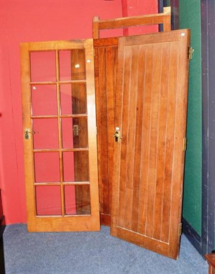 Lot 1261 - A Pair of Robert  "Mouseman " Thompson Oak Tongue and Groove Internal Doors, each with recessed...